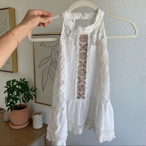 White sleeveless top